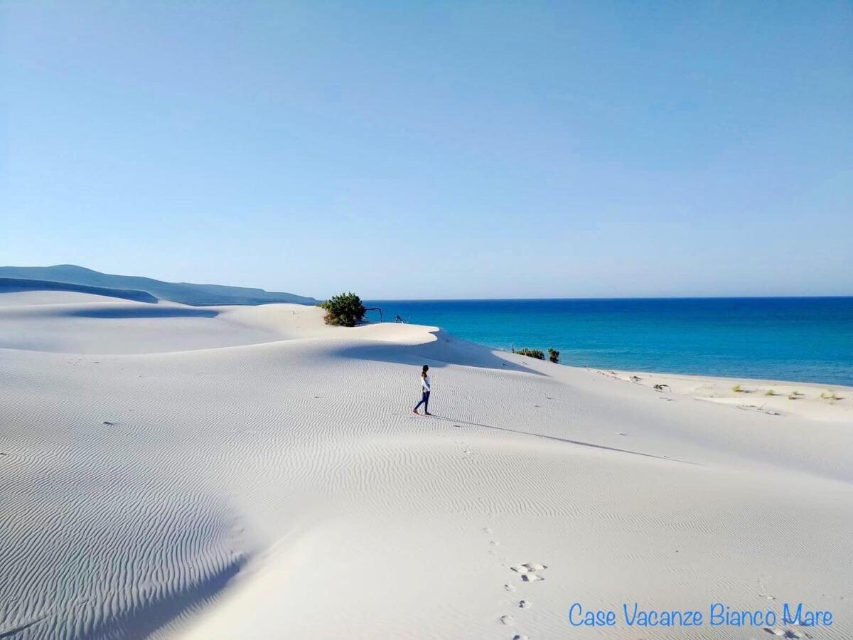 Case Vacanze "Bianco Mare" Porto Pino Extérieur photo