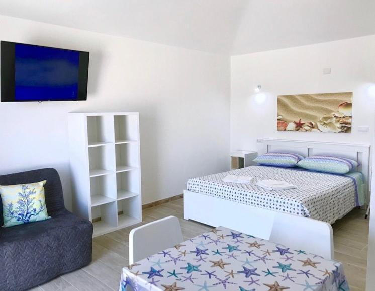 Case Vacanze "Bianco Mare" Porto Pino Extérieur photo