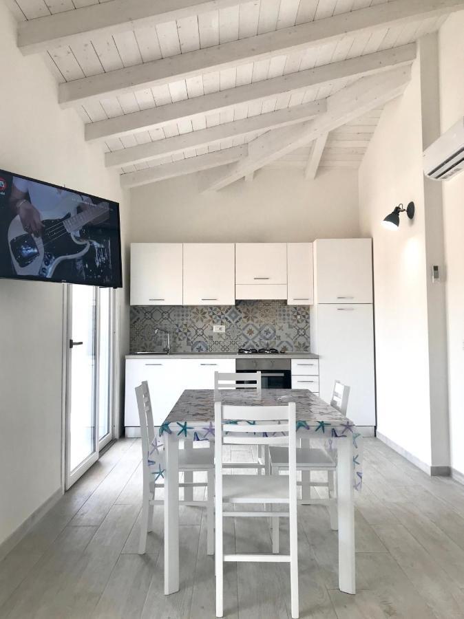 Case Vacanze "Bianco Mare" Porto Pino Extérieur photo