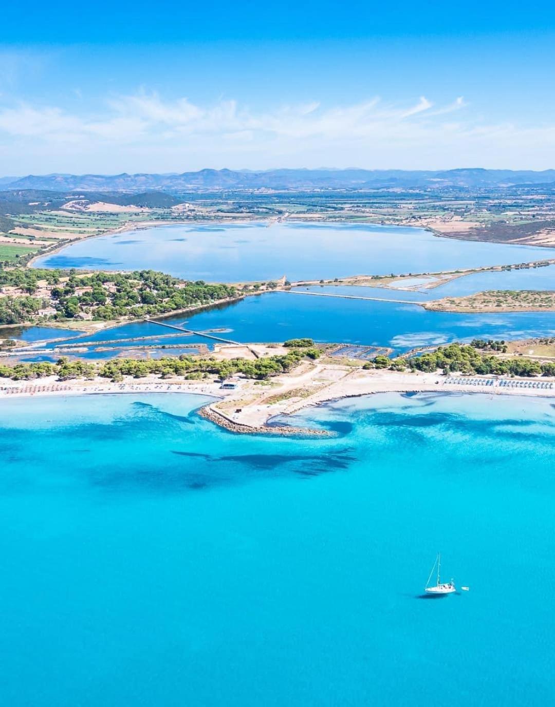 Case Vacanze "Bianco Mare" Porto Pino Extérieur photo