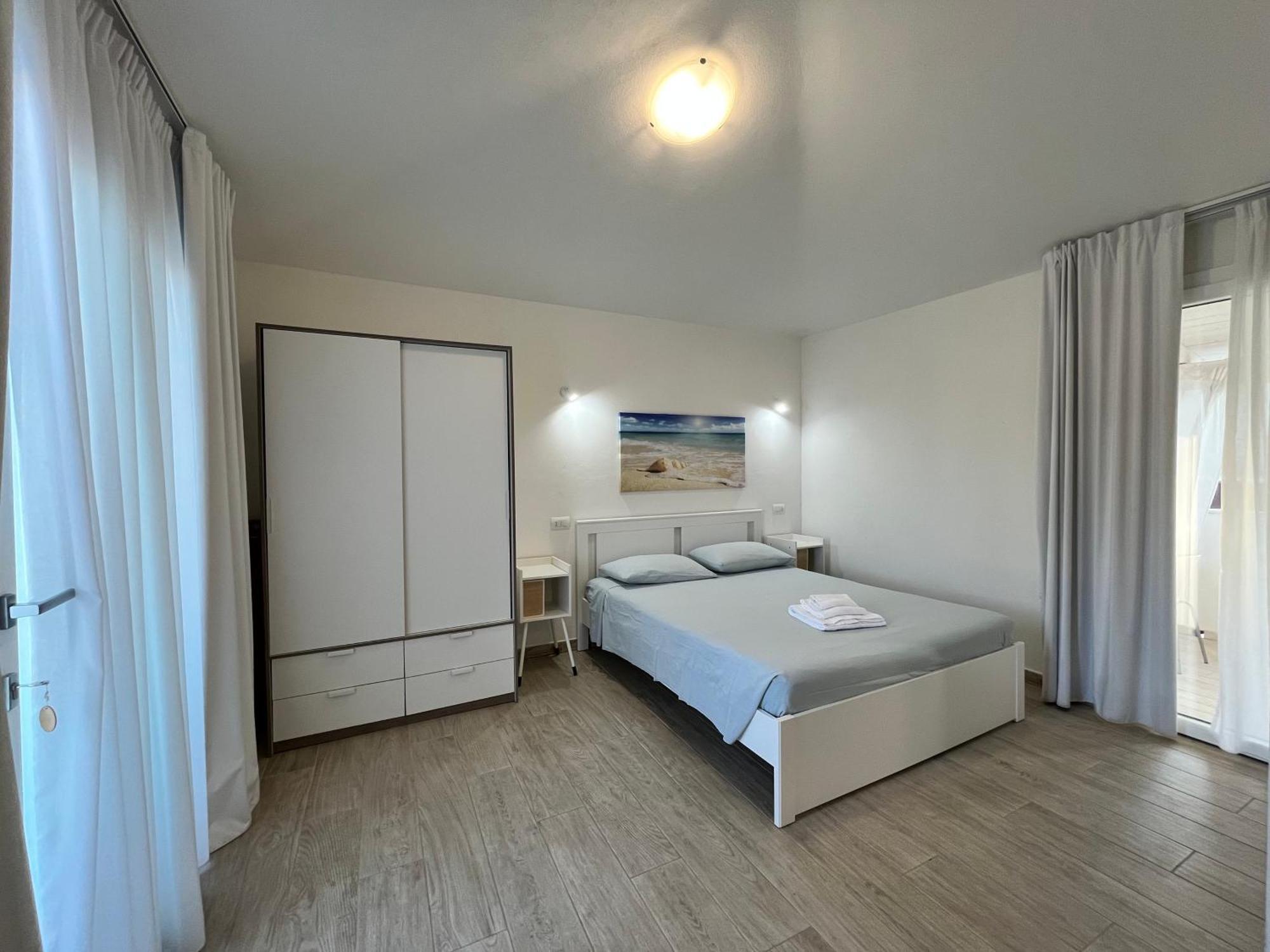 Case Vacanze "Bianco Mare" Porto Pino Extérieur photo