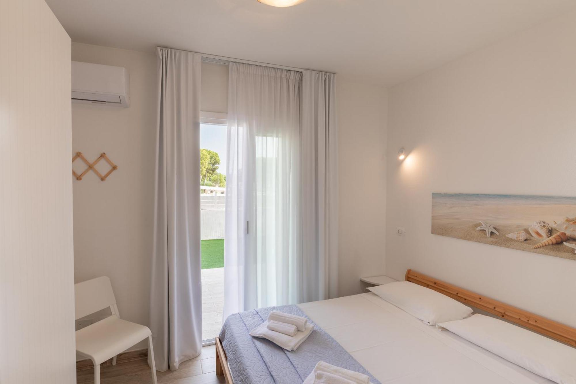 Case Vacanze "Bianco Mare" Porto Pino Chambre photo