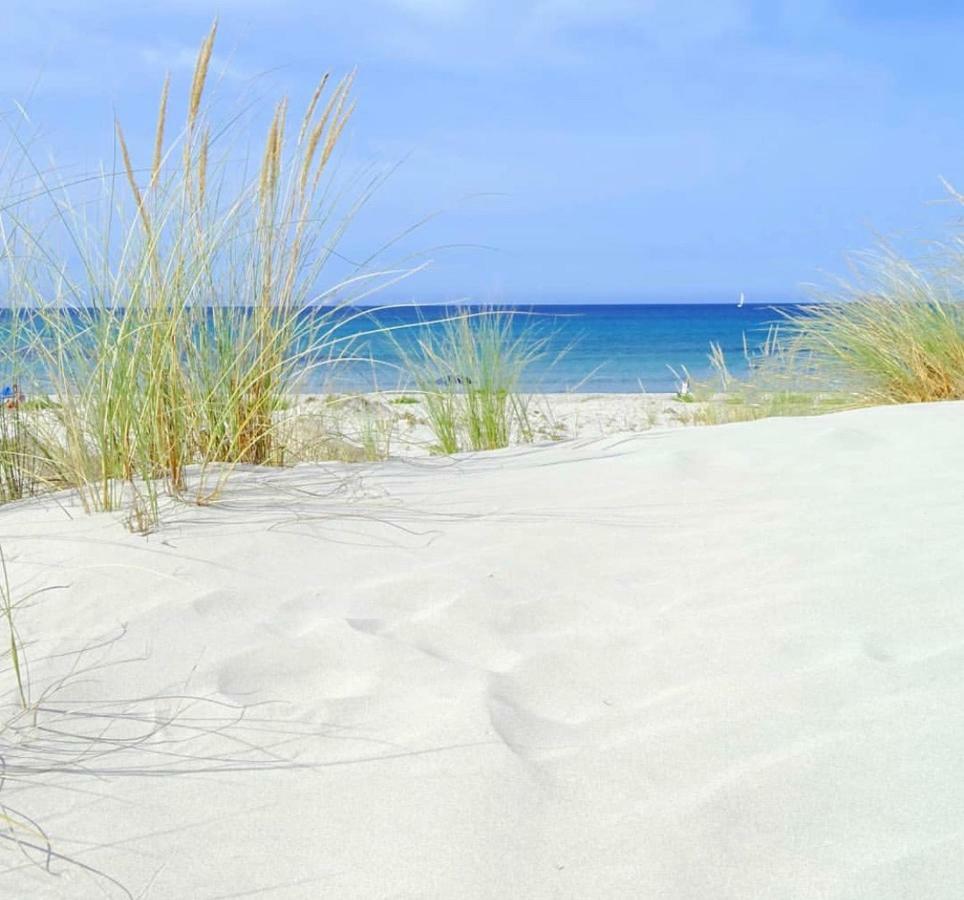 Case Vacanze "Bianco Mare" Porto Pino Extérieur photo